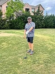 A fashion designer wearing the pattern printed polo standing on the lawn, highly praised the washability and water resistance of it's H760 blended fabrics
