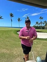 Distributor customer trying red pattern polo working in golf course, showling high-quality clothing samples which help them win bulk orders